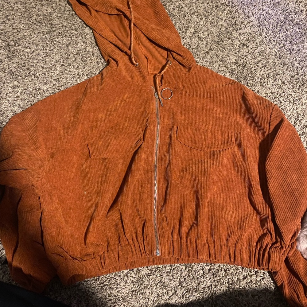 Orange zip up